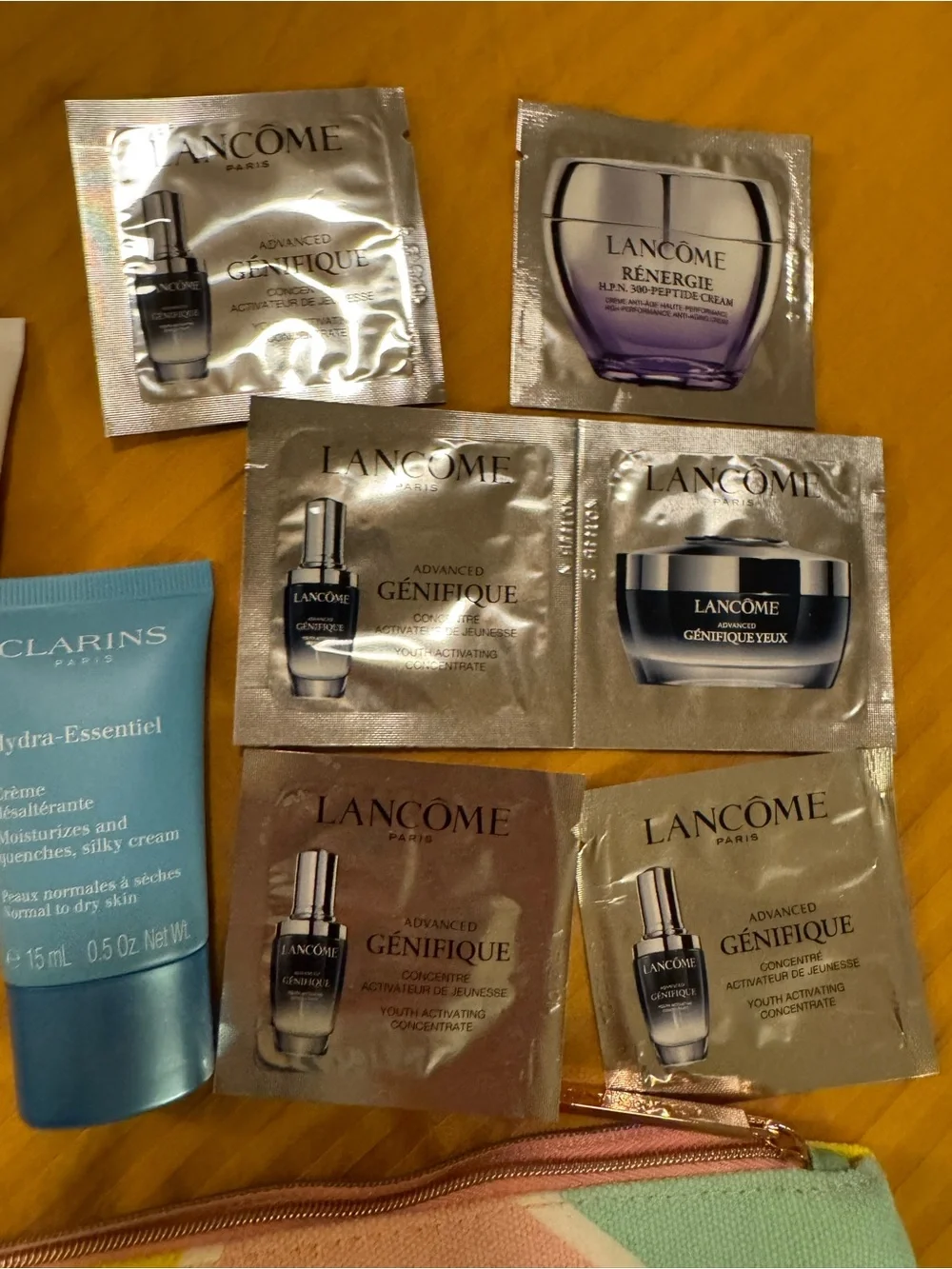 Clarins Pouch with Clarins and other product samples